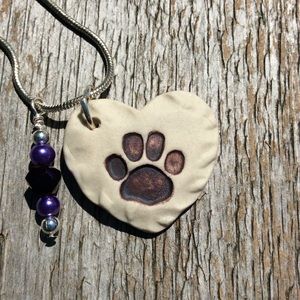 Dog paw on heart charming necklace